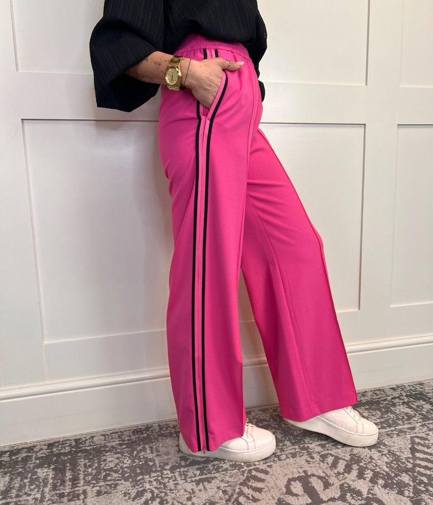 Pink striped palazzo pants on sale