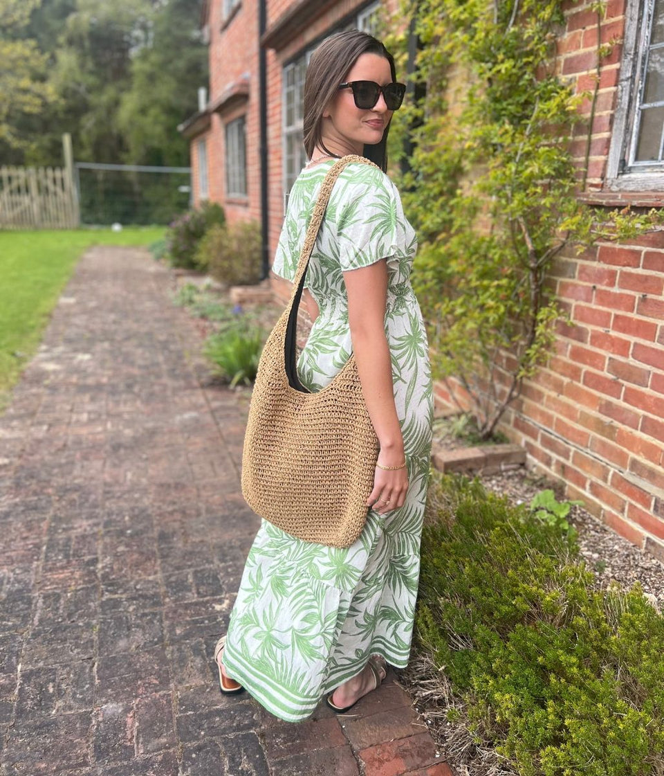 lovely sundress in a green floral print back