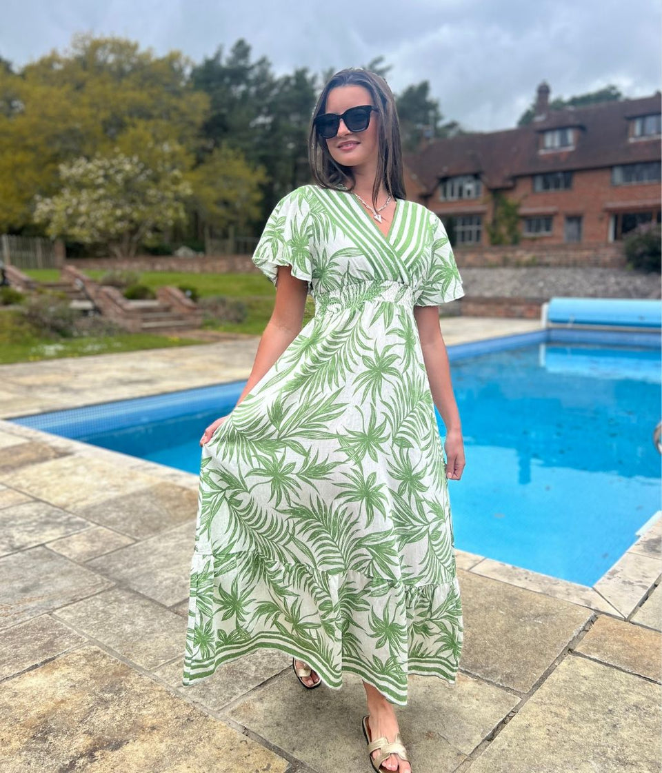 stunning summer dress in green showing fullness of the skirt