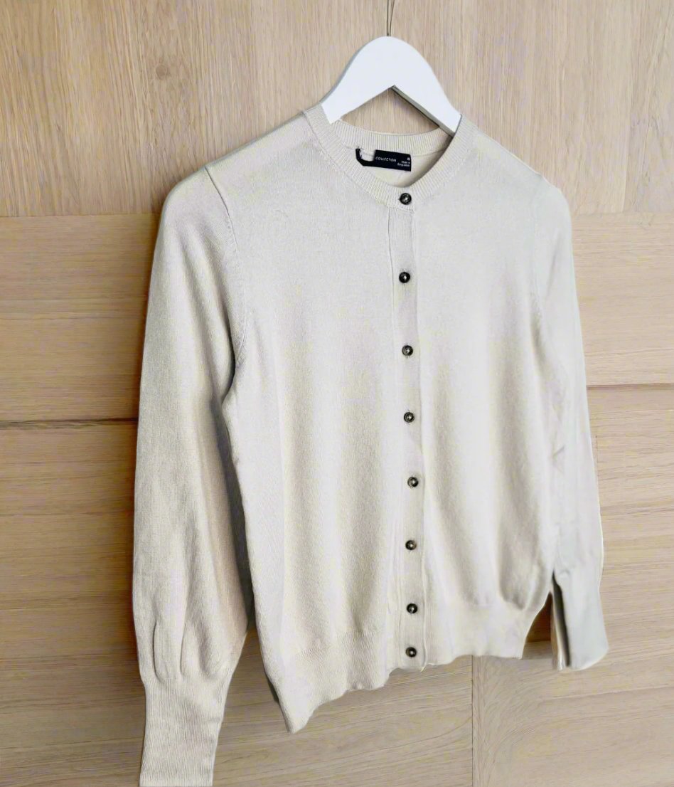 beige cardigan with buttons